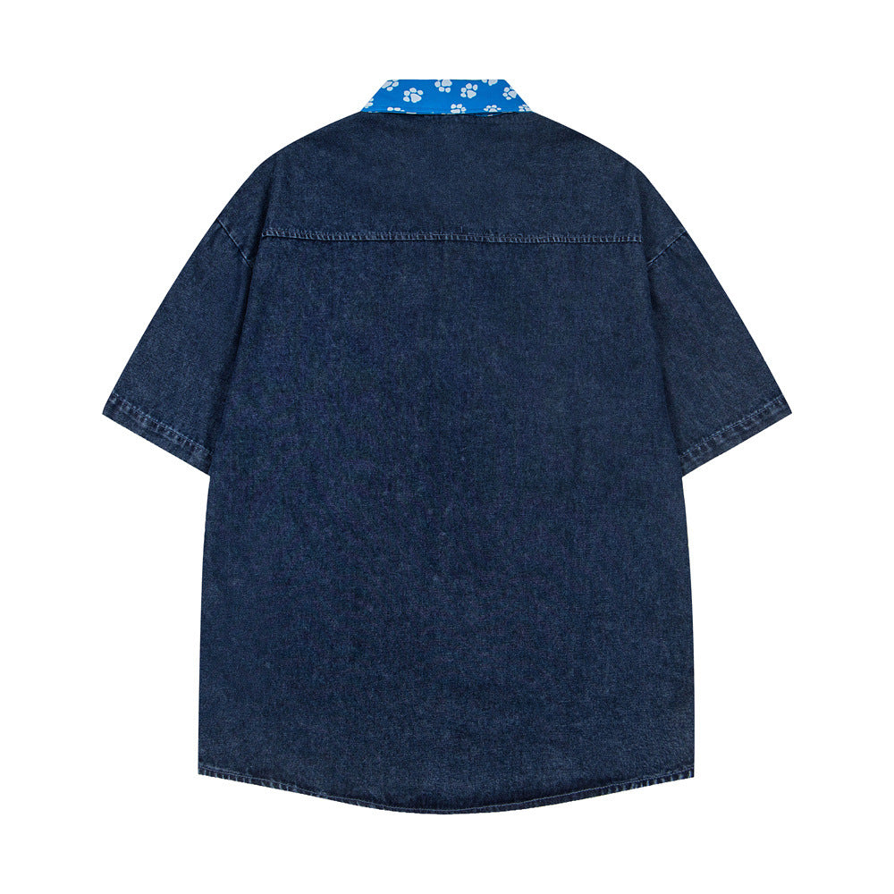 Embroidered denim short sleeved shirt with adhesive fabric